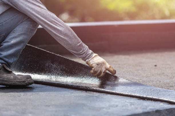 Professional Waterproofing technician working in Pound, WI